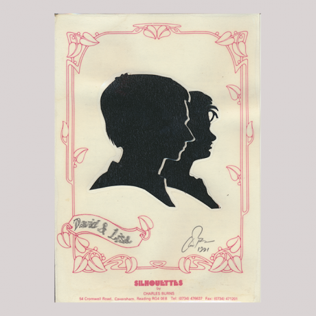 
        Front of silhouette, with two boys looking right. Close-up a boy; in the background a girl.